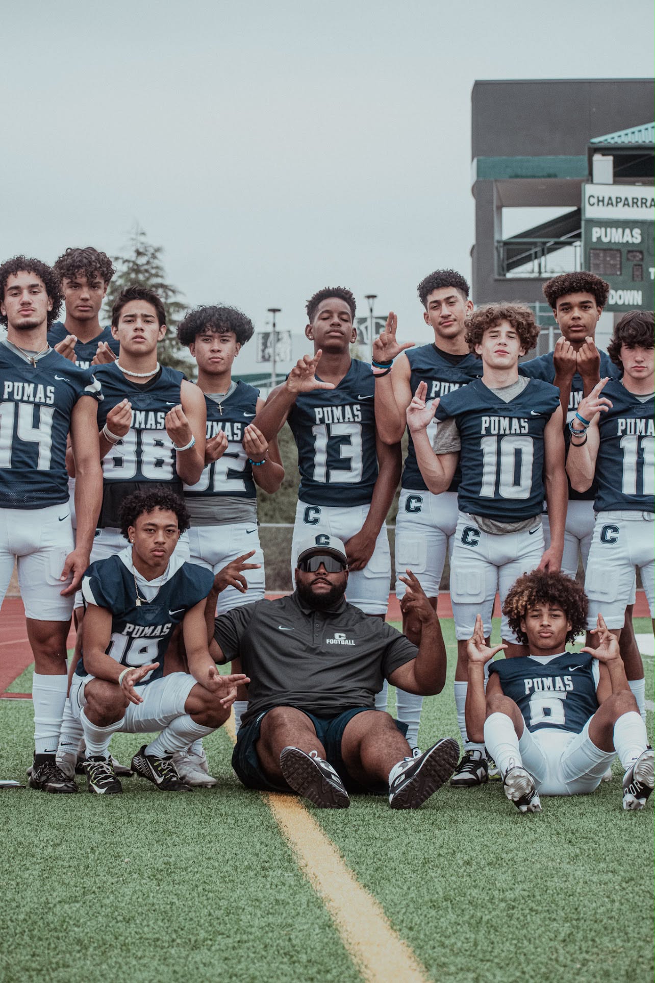 Coach Dee McKneely with his WRs as freshmen  before the offers, commitments and national attention. The foundation was already being built